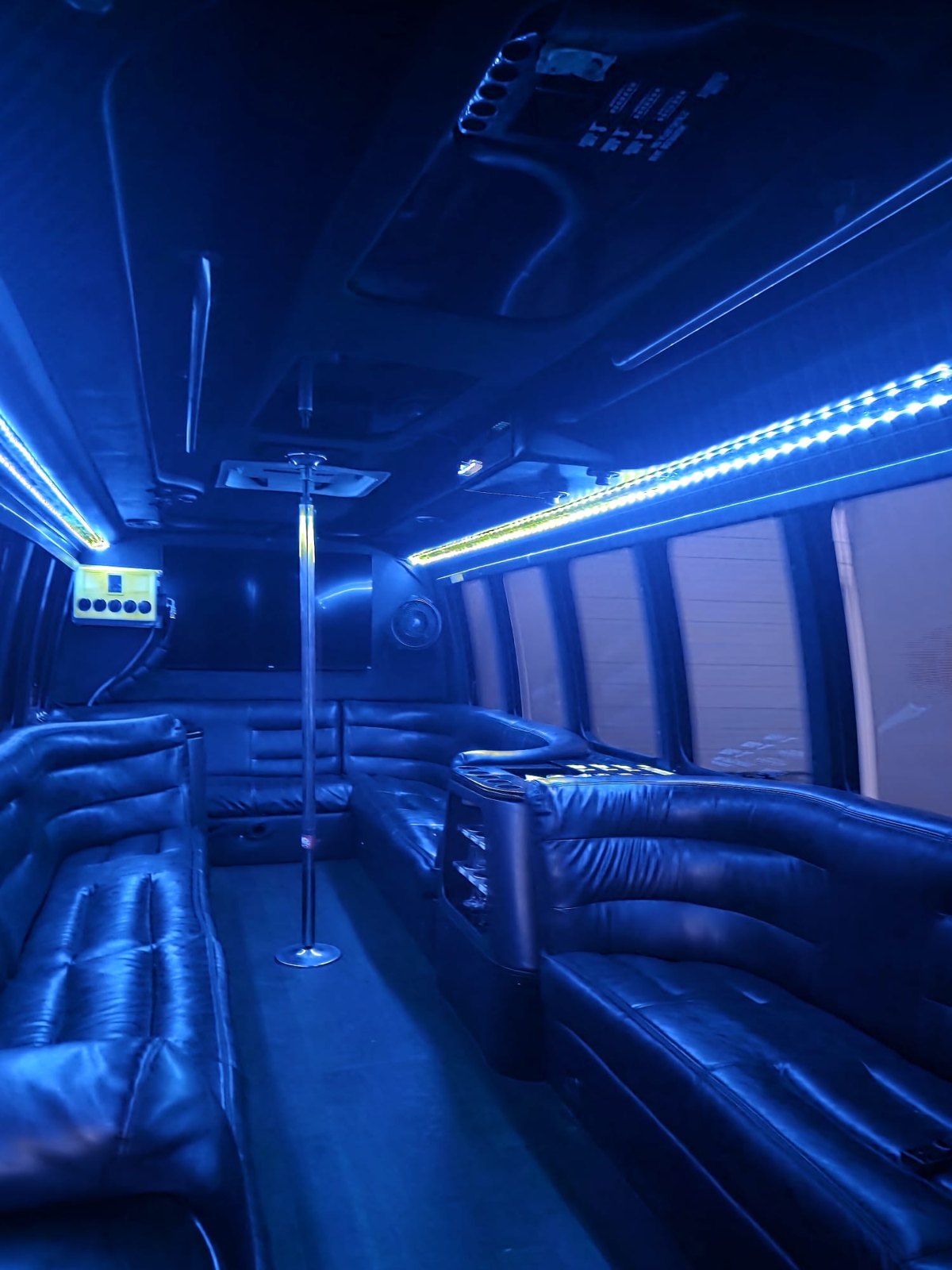 Party Loko Bus interior glowing in blue LED lights